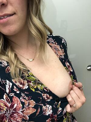 A not so accidental nip slip at the office for Titty Tuesday